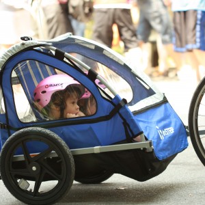 Children in a bike trailer